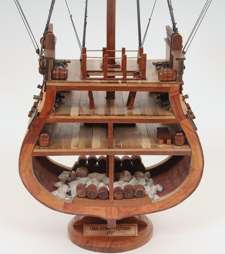 Cropped view of 34" Brown Boat Model Sculpture focusing on the brown surface.