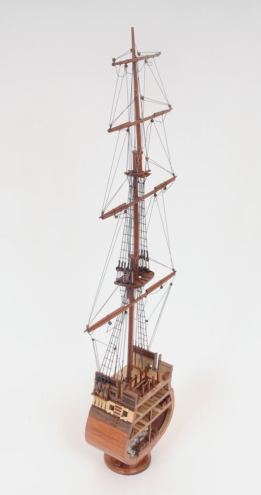 34" Brown Boat Model Sculpture. Sculpture isolated on a plain white background, in a brown finish.