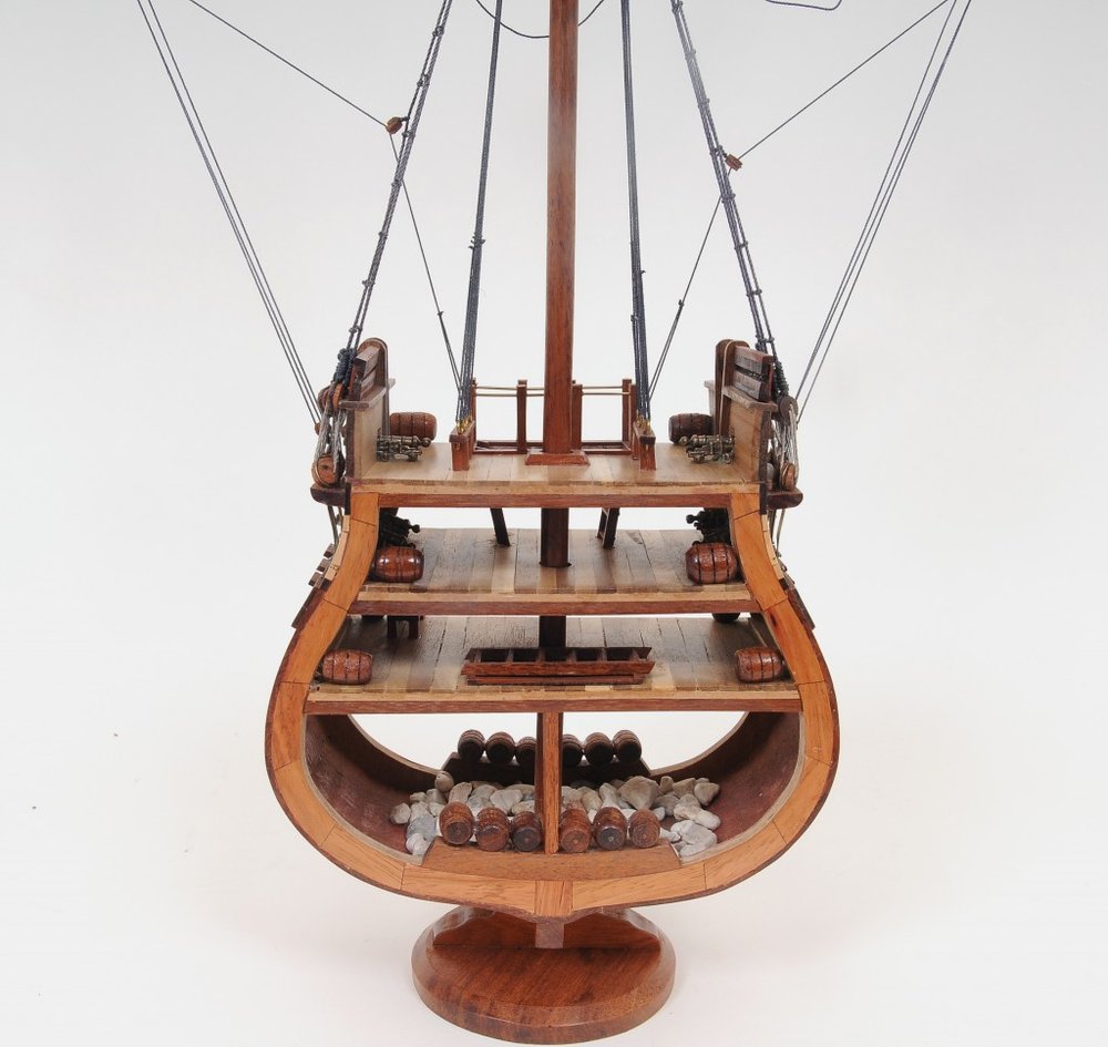 34" Brown Boat Model Sculpture. Sculpture isolated on a plain white background, finished in brown.