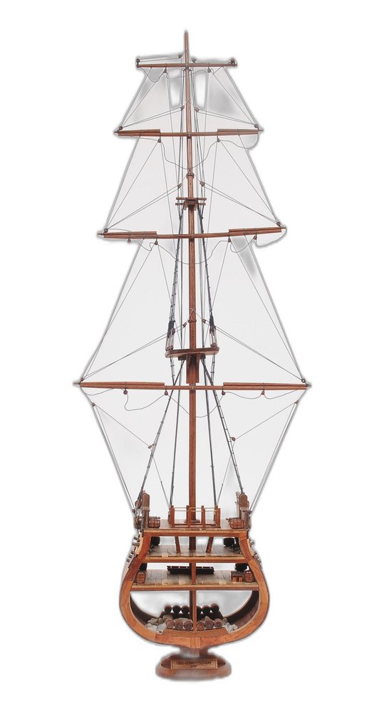34" Brown Boat Model Sculpture. Sculpture isolated on a plain white background, showing its brown color.
