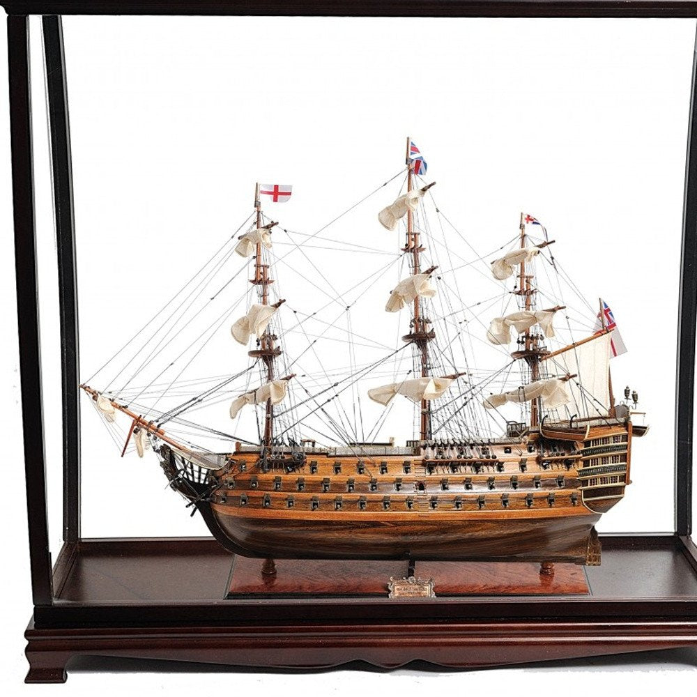 39" Brown Solid Wood Hand Painted Boat Model Boat. Sculpture isolated on a plain white background, finished in brown wood.