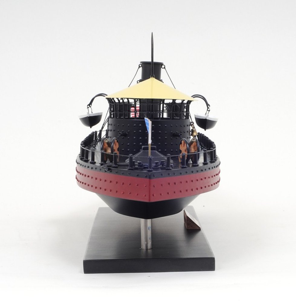 11" Black and Red Solid Wood Hand Painted 1862 USS Monitor Model Boat. Home product isolated on a plain white background, in a black wood finish.
