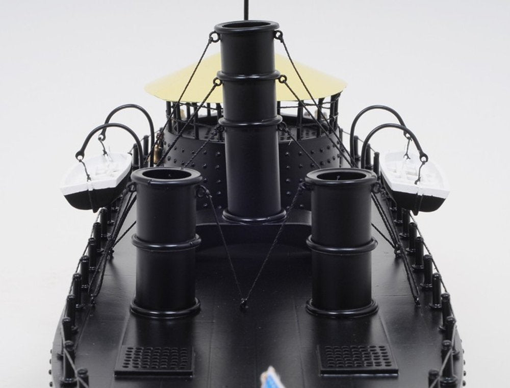 11" Black and Red Solid Wood Hand Painted 1862 USS Monitor Model Boat. Home product isolated on a plain white background, in a black wood finish.