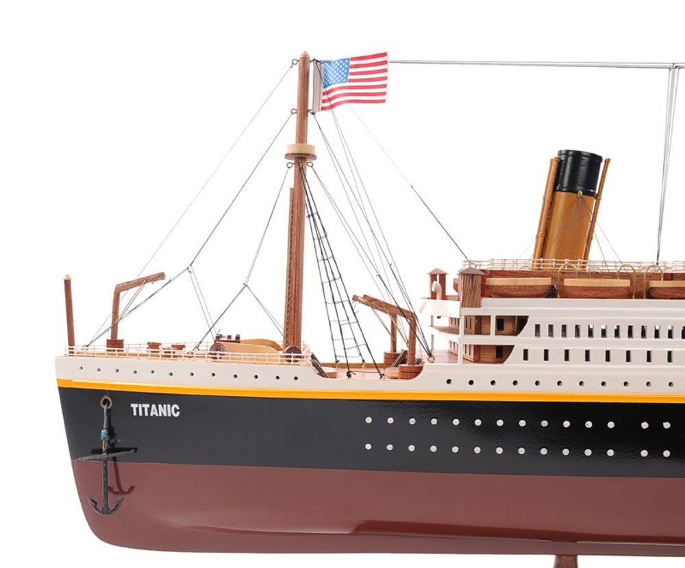 14" Black And Red Solid Wood Hand Painted Boat Model Boat. Home product isolated on a plain white background, finished in black wood.