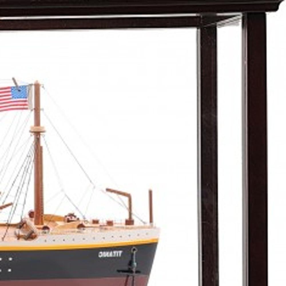 15" Black And Red Solid Wood Hand Painted Boat Model Boat photographed against a dark studio background in black.