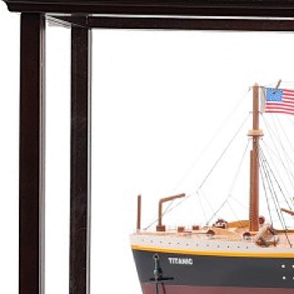 15" Black And Red Solid Wood Hand Painted Boat Model Boat photographed against a dark studio background in black.