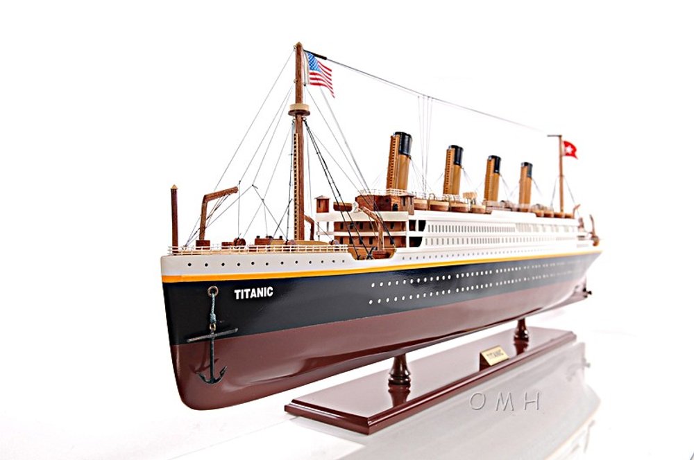11" Black And Red Solid Wood Hand Painted Boat Model Boat. Home product isolated on a plain white background, showing a wood surface.