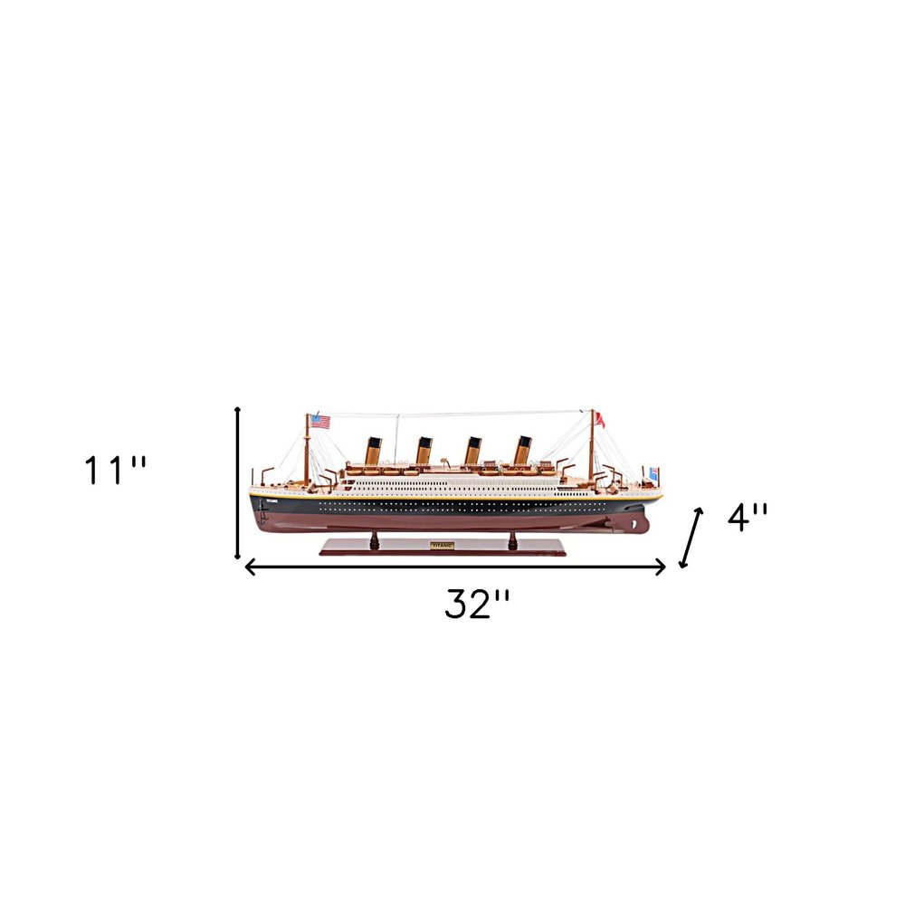 11" Black And Red Solid Wood Hand Painted Boat Model Boat. Home product isolated on a plain white background, showing a red wood surface.
