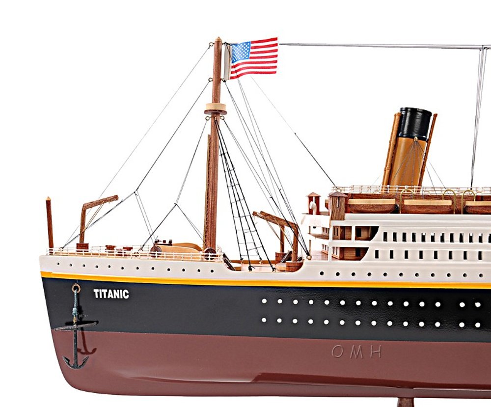 11" Black And Red Solid Wood Hand Painted Boat Model Boat. Home product isolated on a plain white background, finished in black wood.