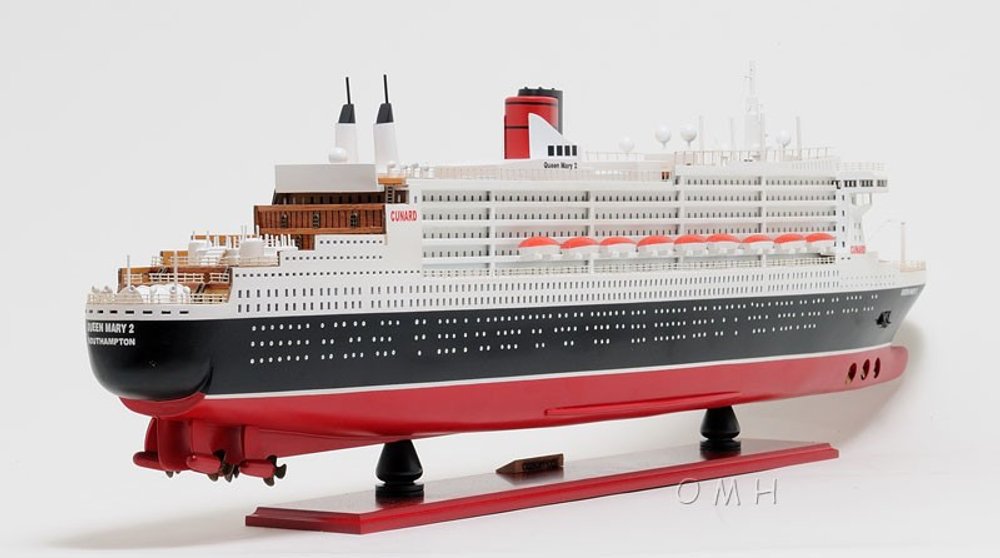 13" Black and Red RMS Queen Mary II Large Boat Hand Painted Decorative Boat. Home product isolated on a plain white background, finished in black.