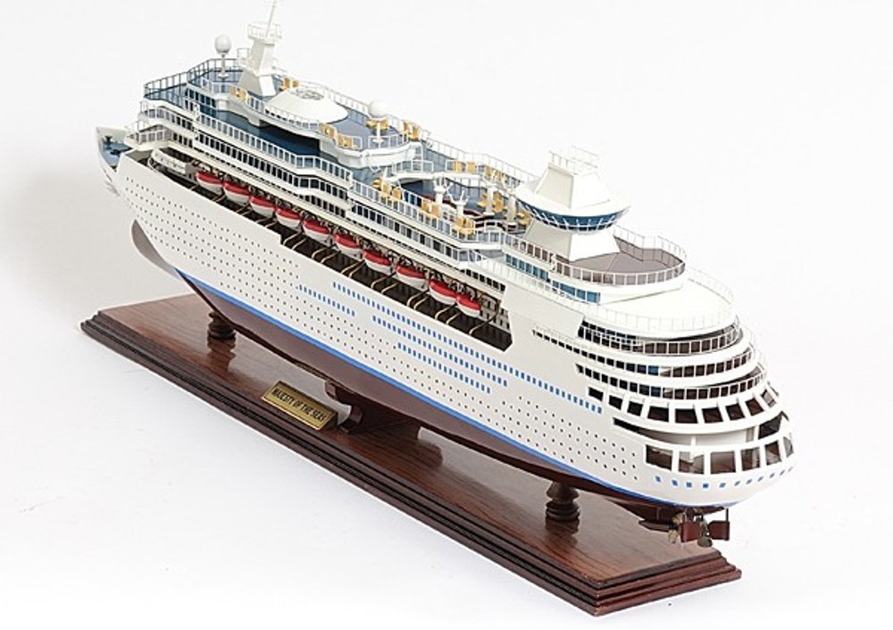 13" Brown and White Majesty of the Seas Boat Hand Painted Decorative Boat. Home product isolated on a plain white background, finished in white.