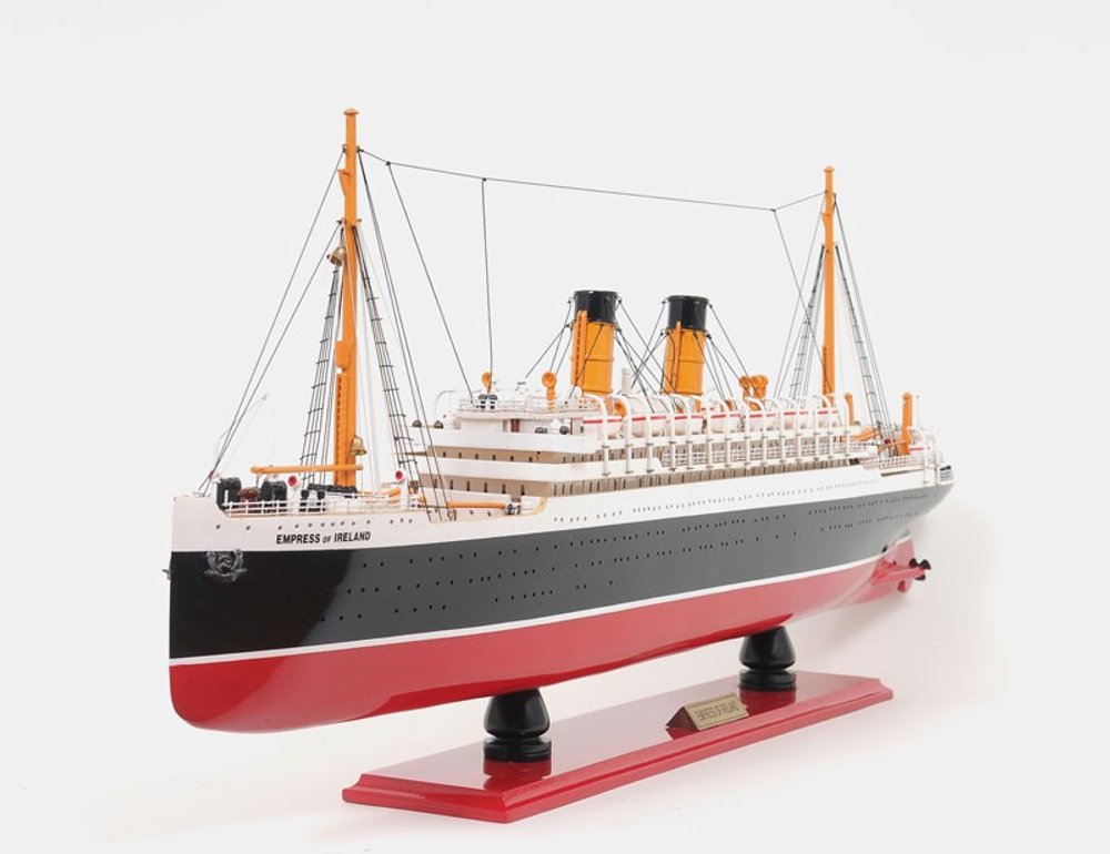 13" Black and Red Solid Wood Hand Painted RMS Empress of Ireland Model Boat. Home product isolated on a plain white background, showing a black wood surface.