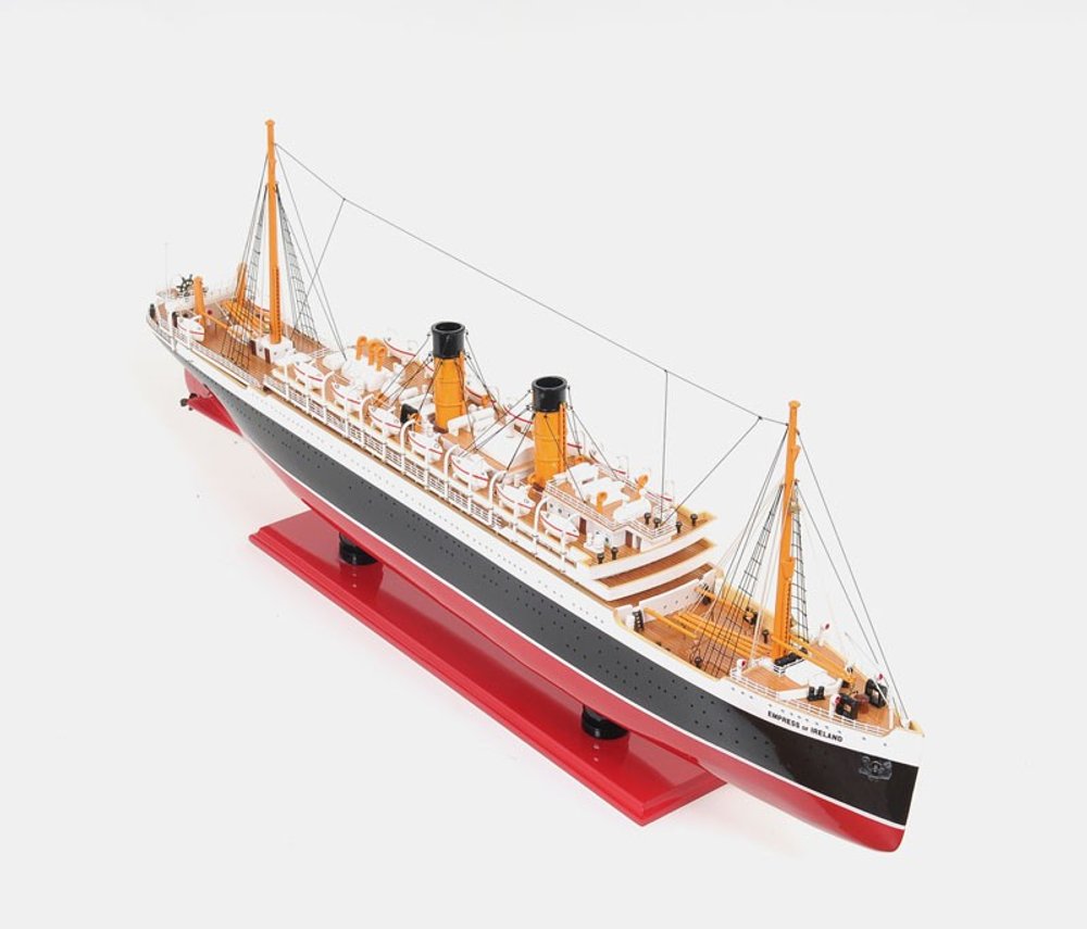 13" Black and Red Solid Wood Hand Painted RMS Empress of Ireland Model Boat. Home product isolated on a plain white background, showing a wood surface.