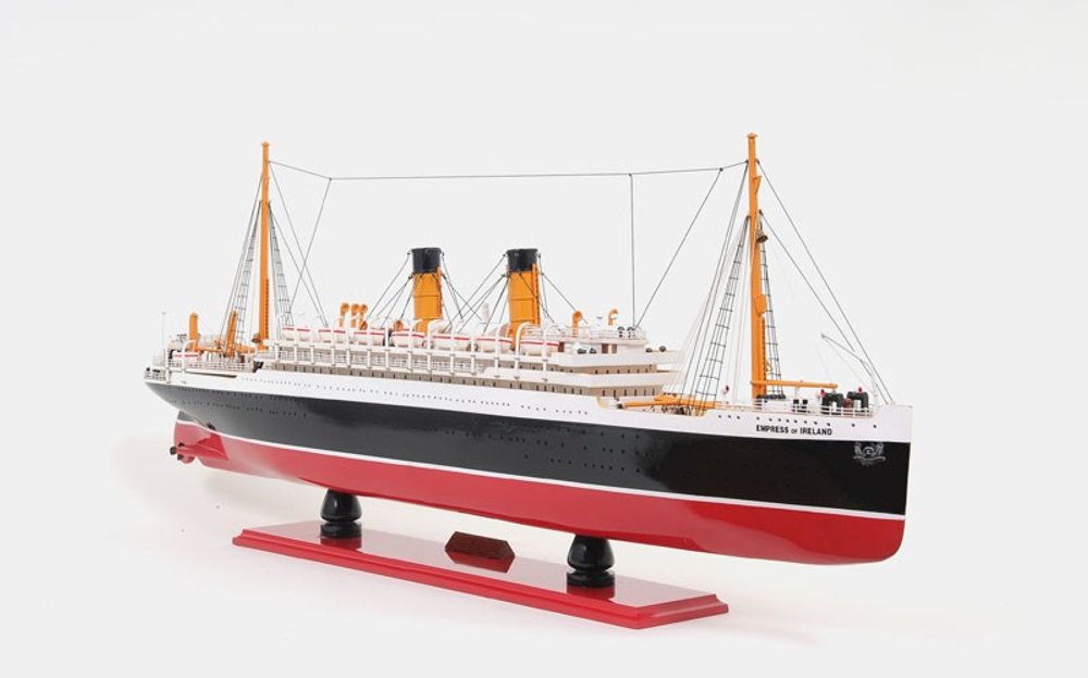 13" Black and Red Solid Wood Hand Painted RMS Empress of Ireland Model Boat. Home product isolated on a plain white background, finished in black wood.