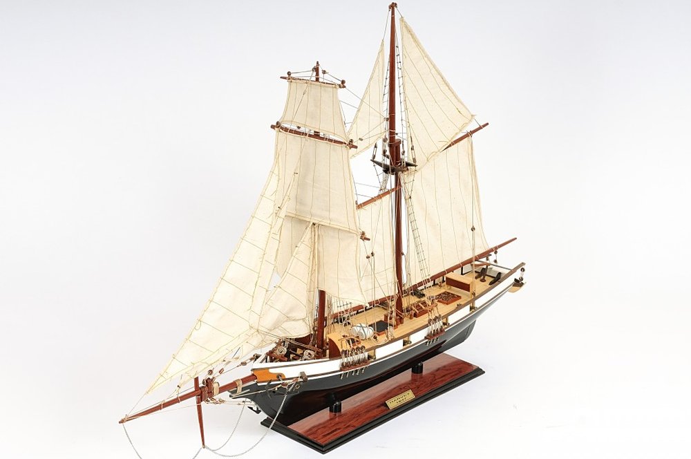 26" Black and White Solid Wood Hand Painted p-Oxybis(benzenesulfonyl hydrazide) Model Boat. Home product isolated on a plain white background, finished in white wood.