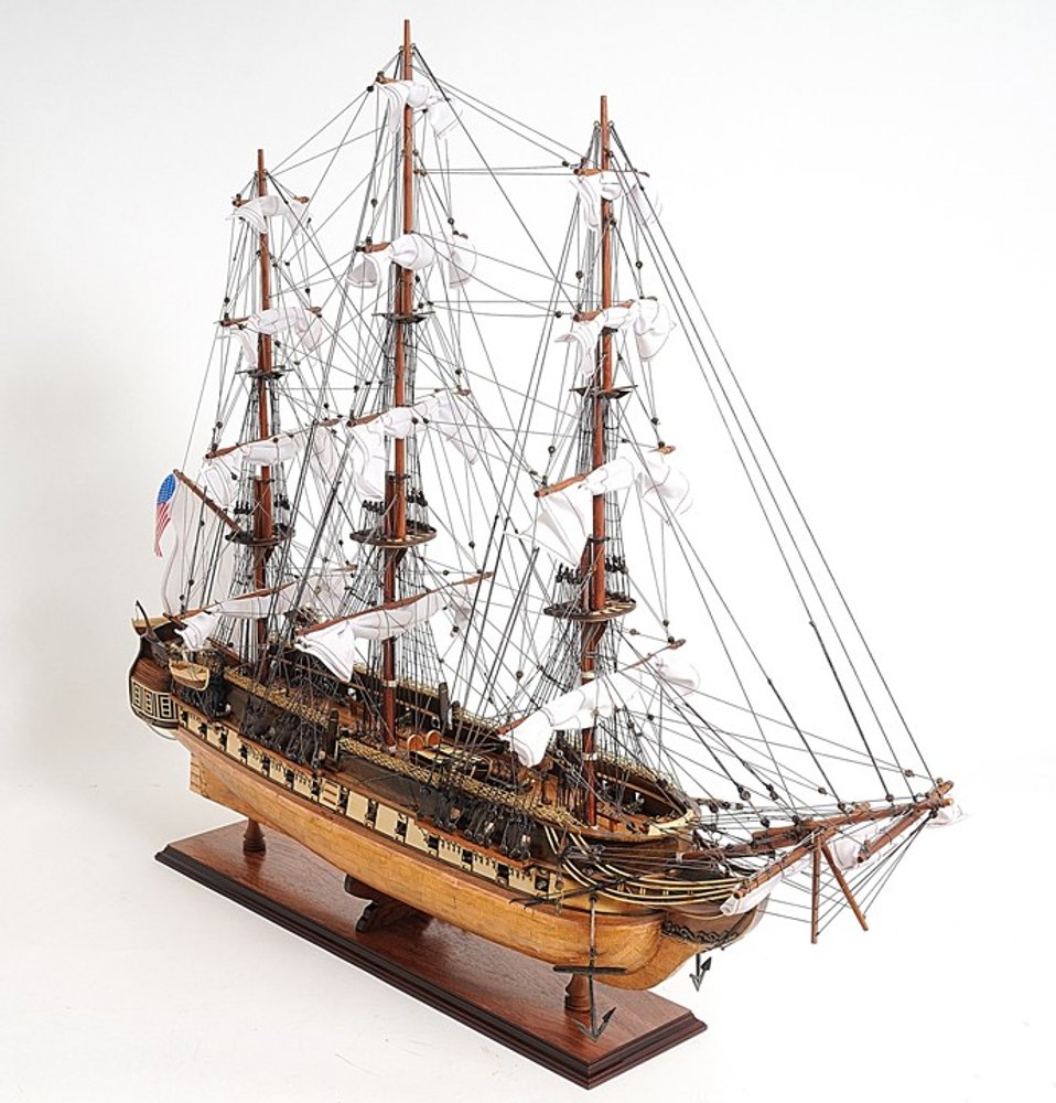 32" Brown Solid Wood Hand Painted Boat Model Boat. Home product isolated on a plain white background, in a brown wood finish.