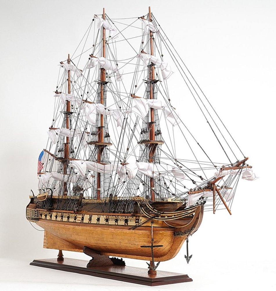 32" Brown Solid Wood Hand Painted Boat Model Boat. Home product isolated on a plain white background, in a brown wood finish.