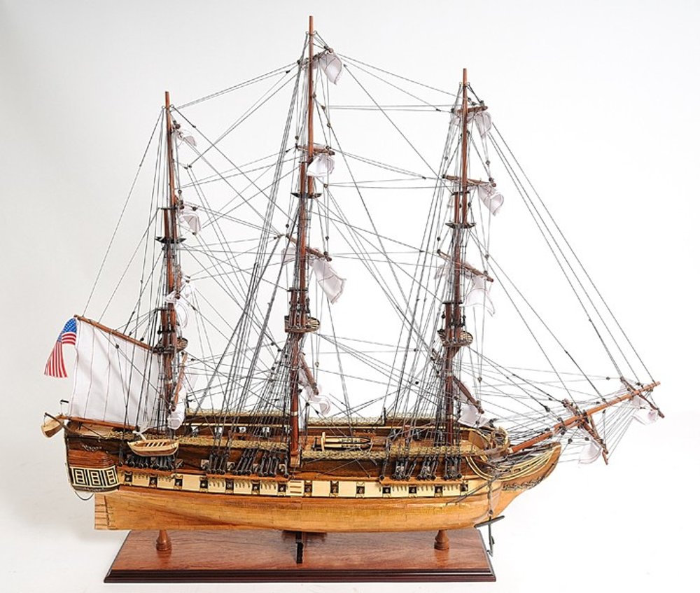32" Brown Solid Wood Hand Painted Boat Model Boat. Home product isolated on a plain white background, finished in brown wood.