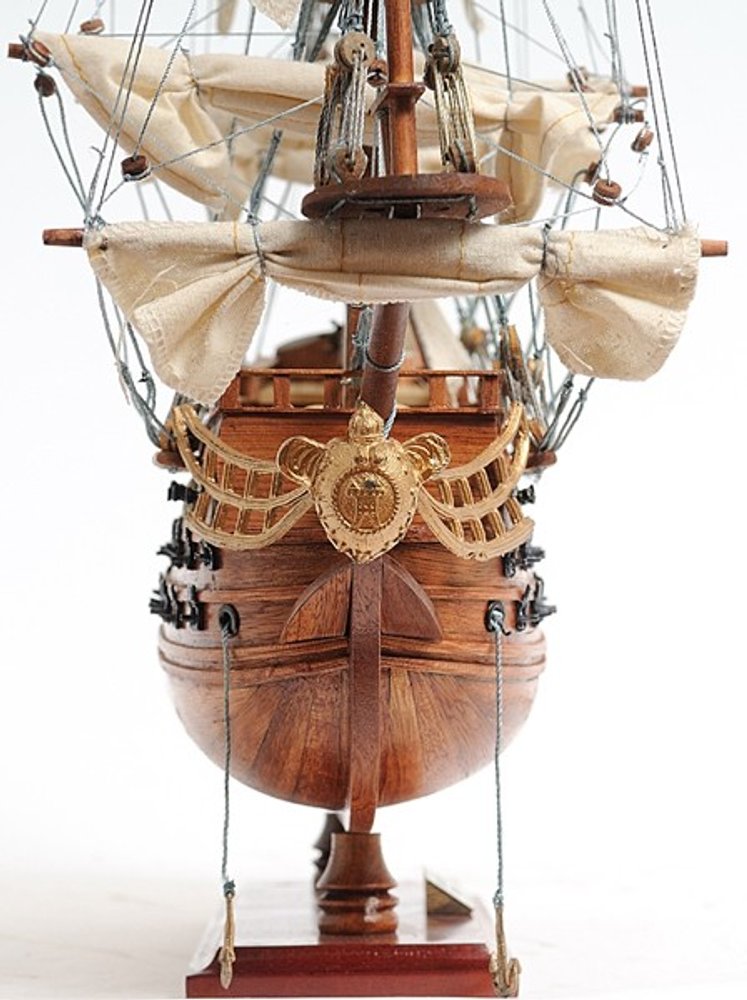 18" Wood Brown Solid Wood Hand Painted San Felipe 1690 Small Model Boat. Home product isolated on a plain white background, showing a brown wood surface.