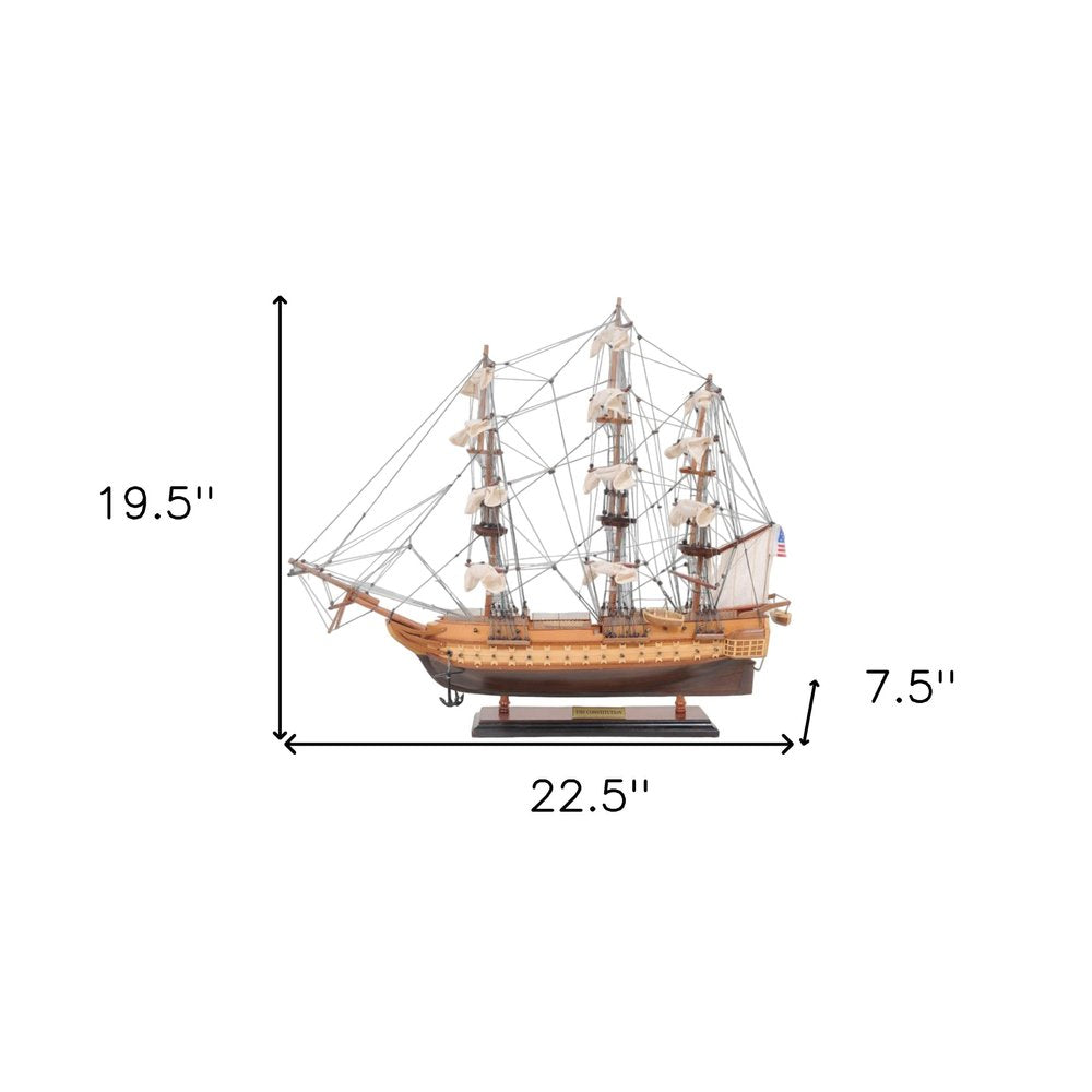 20" Wood Brown Solid Wood Hand Painted 1797 USS Constitution Small Model Boat. Home product isolated on a plain white background, finished in brown wood.