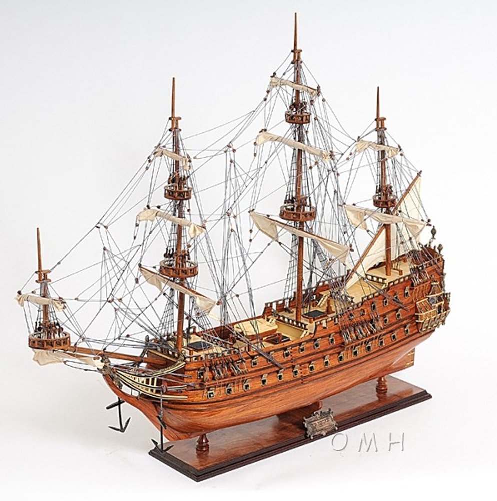 32" Wood Brown Solid Wood Hand Painted c1665 Zeven Provincien Model Boat. Sculpture isolated on a plain white background, finished in brown wood.