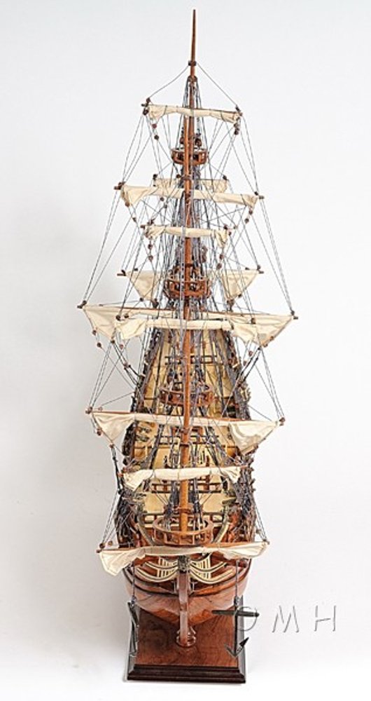 32" Wood Brown Solid Wood Hand Painted c1665 Zeven Provincien Model Boat. Sculpture isolated on a plain white background, in a brown wood finish.