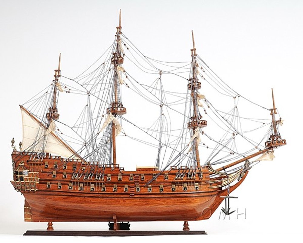 32" Wood Brown Solid Wood Hand Painted c1665 Zeven Provincien Model Boat. Sculpture isolated on a plain white background, in a brown wood finish.