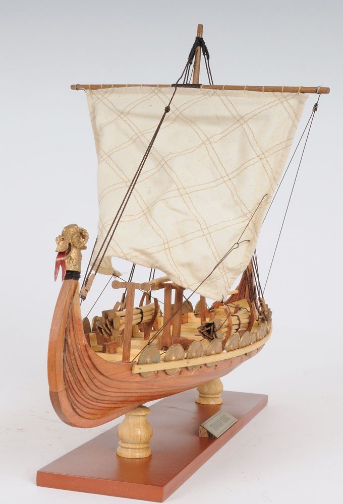 13" Wood Brown Solid Wood Hand Painted Model Boat Tabletop Sculpture. Sculpture isolated on a plain white background, showing a brown wood surface.