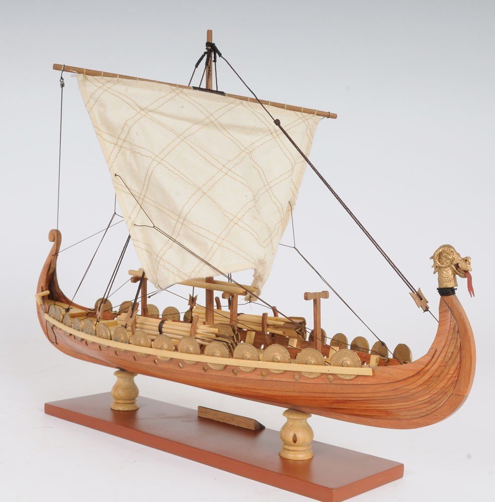 13" Wood Brown Solid Wood Hand Painted Model Boat Tabletop Sculpture. Sculpture isolated on a plain white background, finished in brown wood.