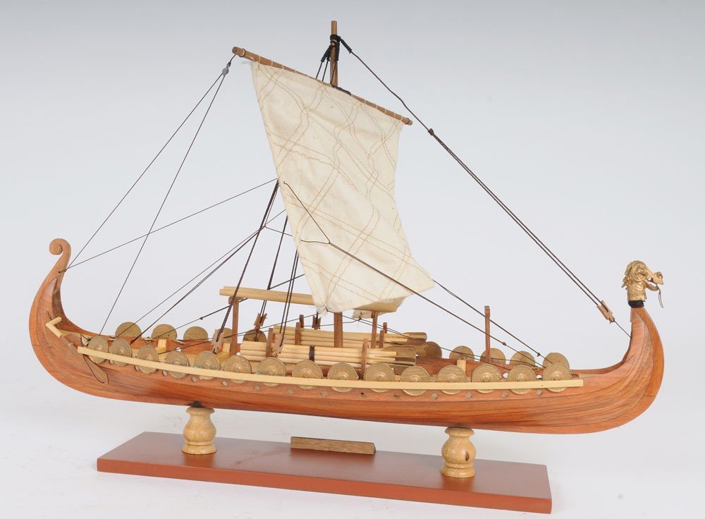 13" Wood Brown Solid Wood Hand Painted Model Boat Tabletop Sculpture. Sculpture isolated on a plain white background, finished in brown wood.