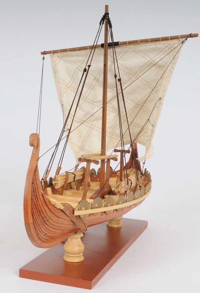 13" Wood Brown Solid Wood Hand Painted Model Boat Tabletop Sculpture. Sculpture isolated on a plain white background, finished in brown wood.