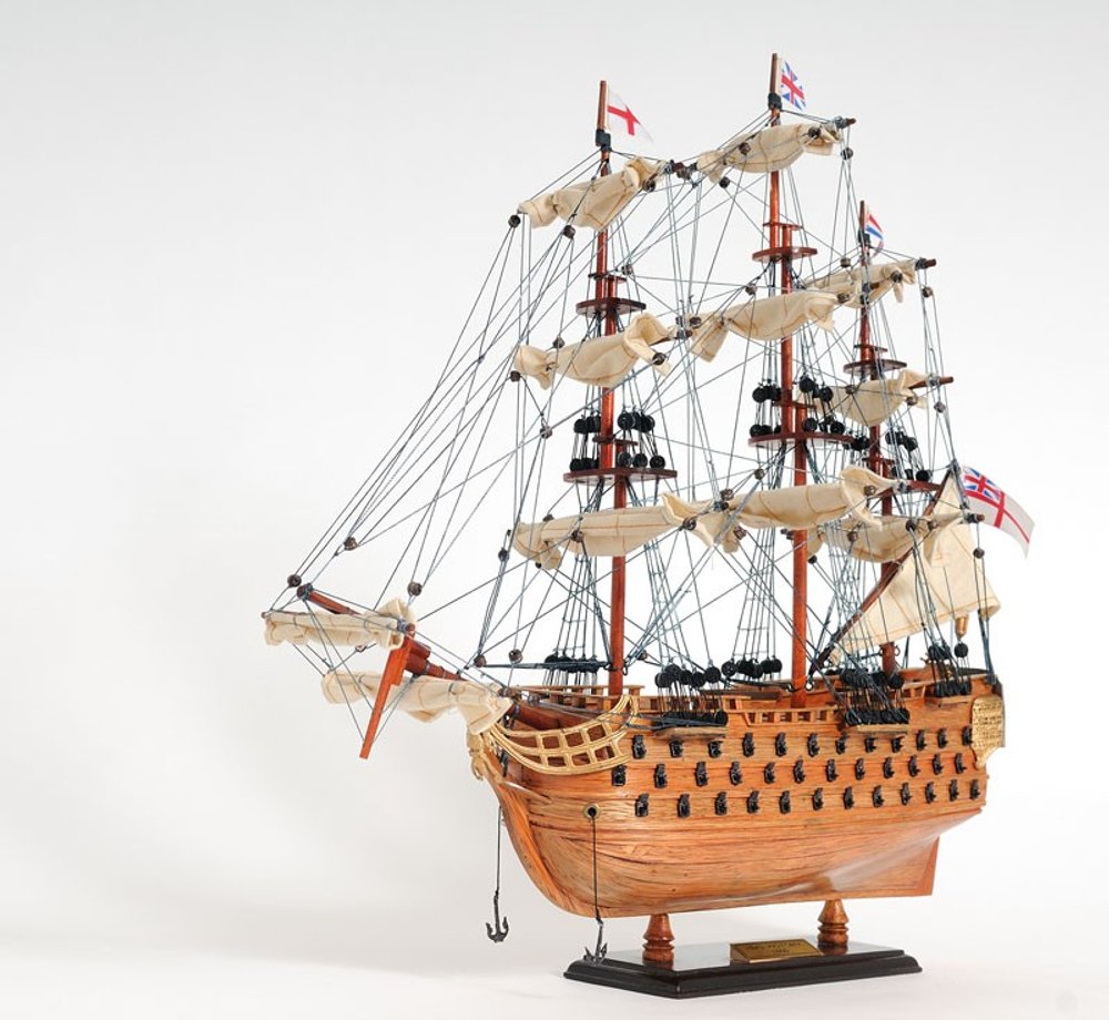 18" Wood Brown HMS Victory Hand Painted Decorative Boat. Home product isolated on a plain white background, finished in brown wood.