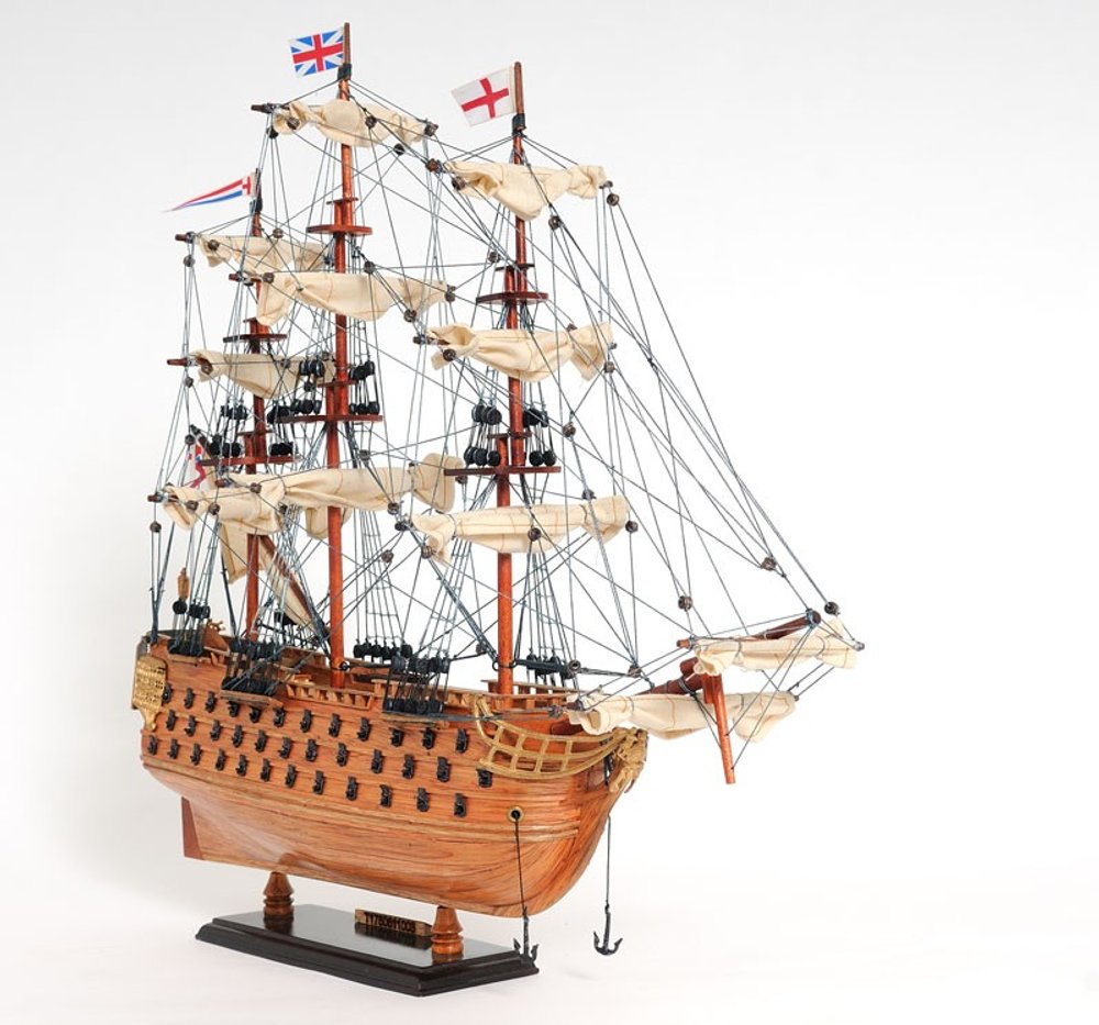 18" Wood Brown HMS Victory Hand Painted Decorative Boat. Home product isolated on a plain white background, finished in brown wood.