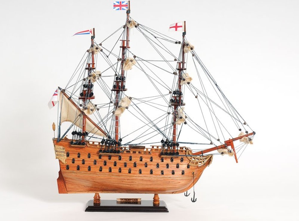 18" Wood Brown HMS Victory Hand Painted Decorative Boat. Home product isolated on a plain white background, finished in brown wood.