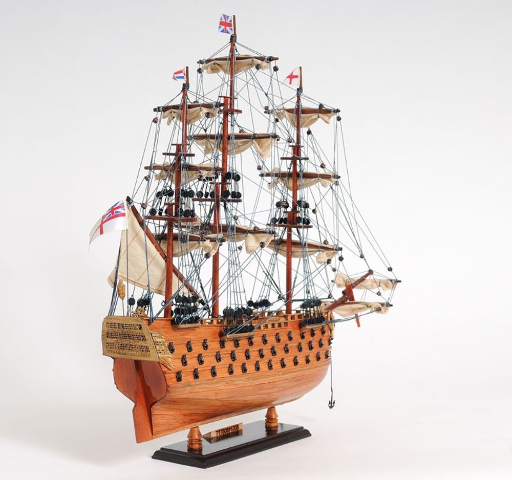 18" Wood Brown HMS Victory Hand Painted Decorative Boat. Home product isolated on a plain white background, showing a wood surface.