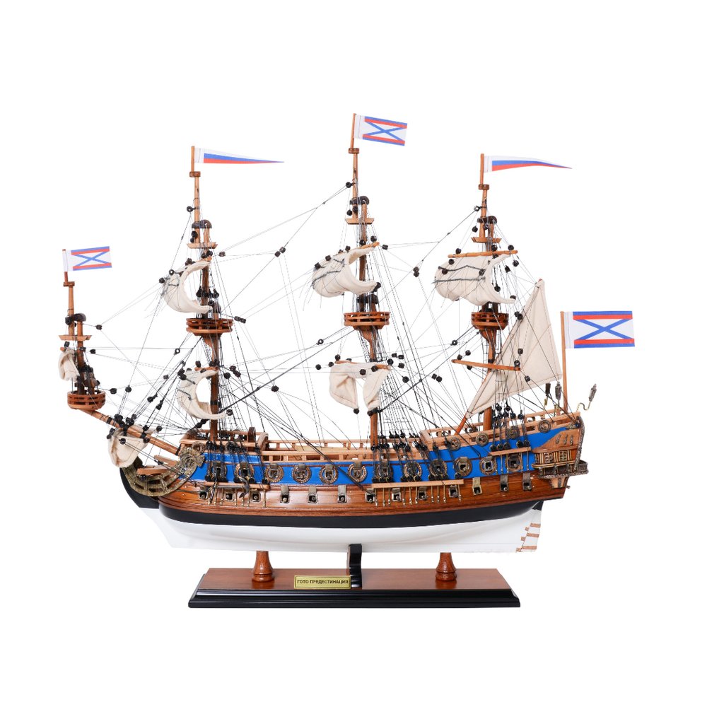 22" Blue and Brown Solid Wood Hand Painted 1700 Goto Predestination Medium Model Boat. Home product isolated on a plain white background, finished in brown wood.