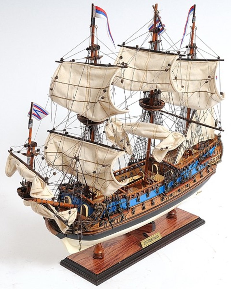 22" Blue and Brown Solid Wood Hand Painted 1700 Goto Predestination Medium Model Boat. Home product isolated on a plain white background, in a brown wood finish.