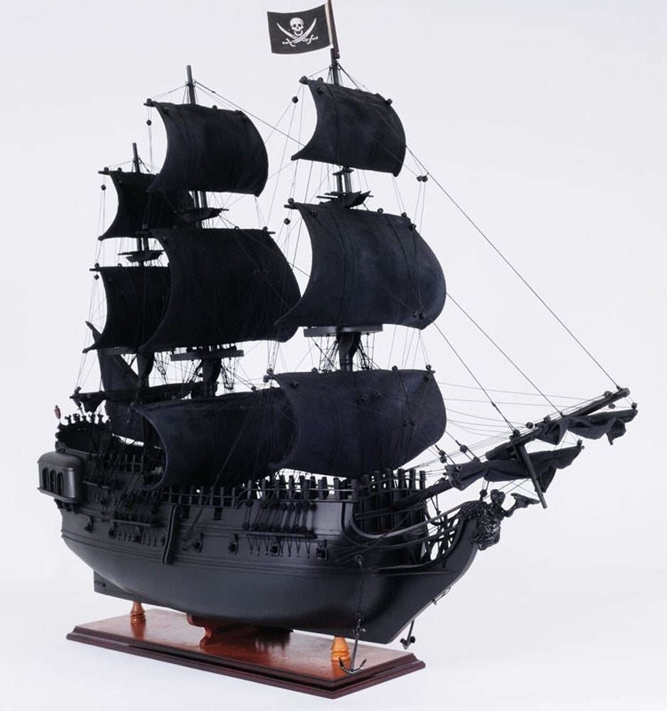 24" Black Solid Wood Hand Painted Model Boat Tabletop Sculpture. Sculpture isolated on a plain white background, in a black wood finish.