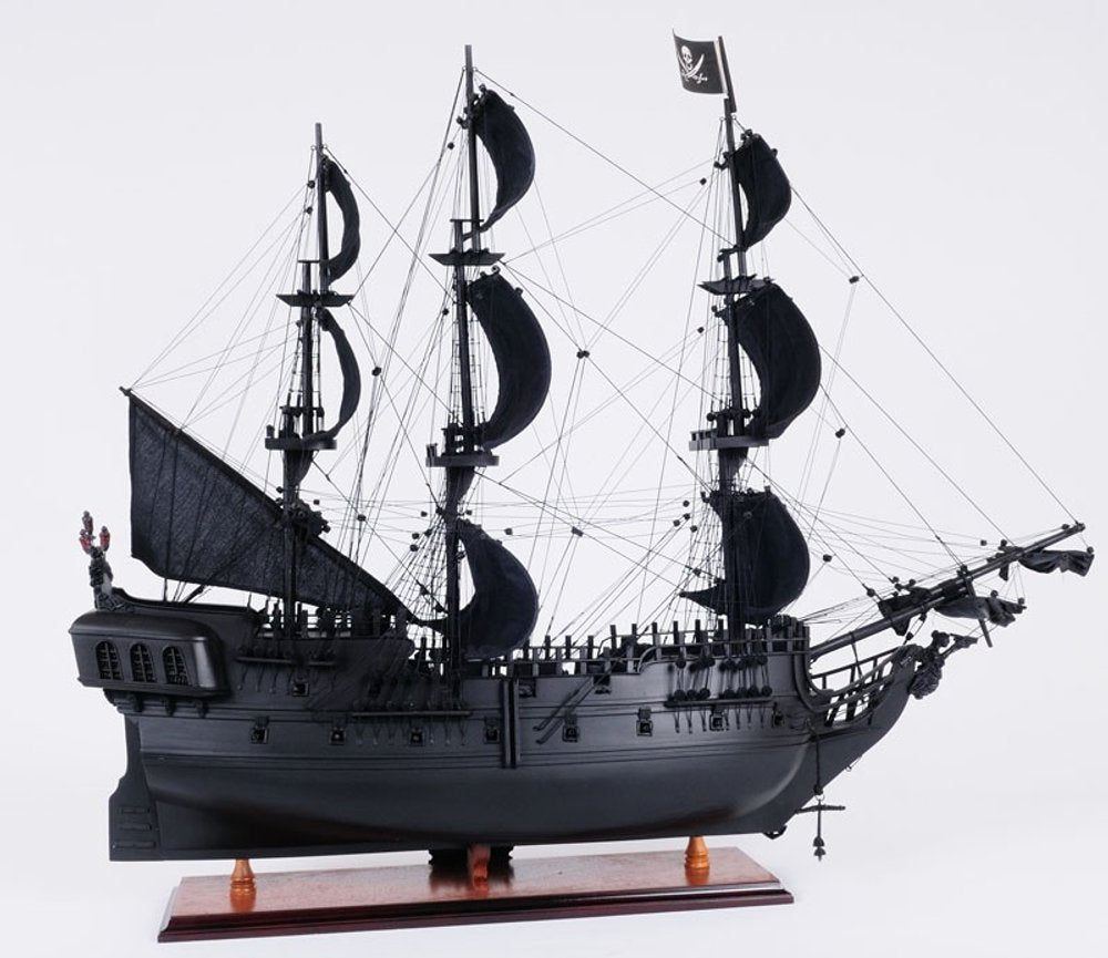24" Black Solid Wood Hand Painted Model Boat Tabletop Sculpture. Sculpture isolated on a plain white background, in a black wood finish.
