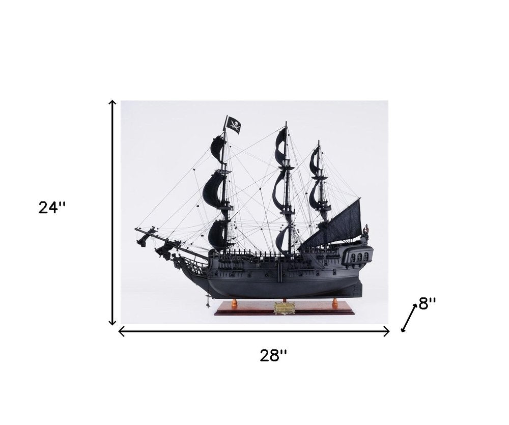 24" Black Solid Wood Hand Painted Model Boat Tabletop Sculpture. Sculpture isolated on a plain white background, showing a black wood surface.