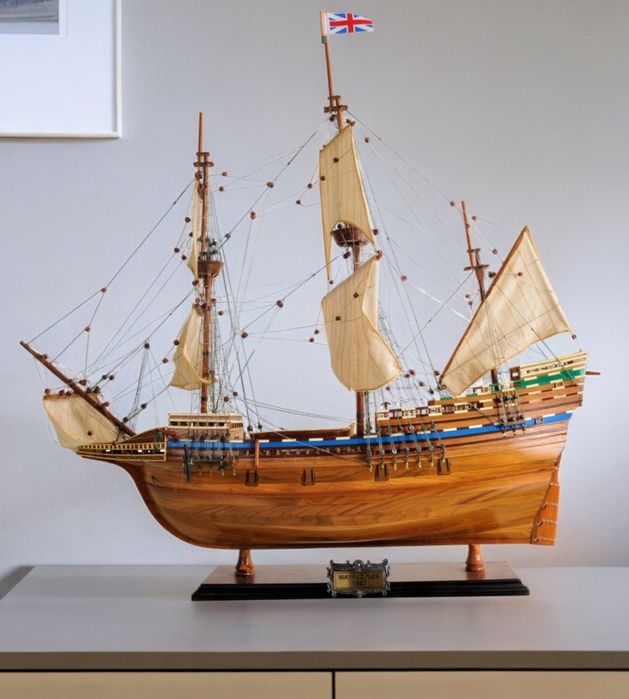 30" Wood Brown Mayflower Boat Hand Painted Decorative Boat shown outdoors on a tiled patio.