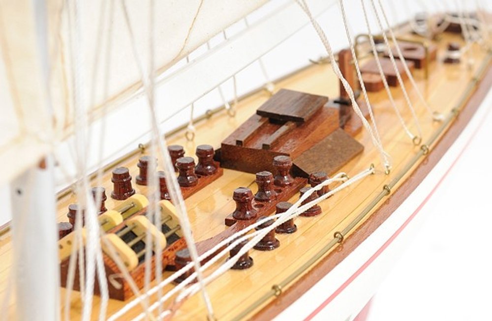 32" Red and White Solid Wood Hand Painted p-Oxybis(benzenesulfonyl hydrazide) Model Boat. Home product isolated on a plain white background, in a white wood finish.