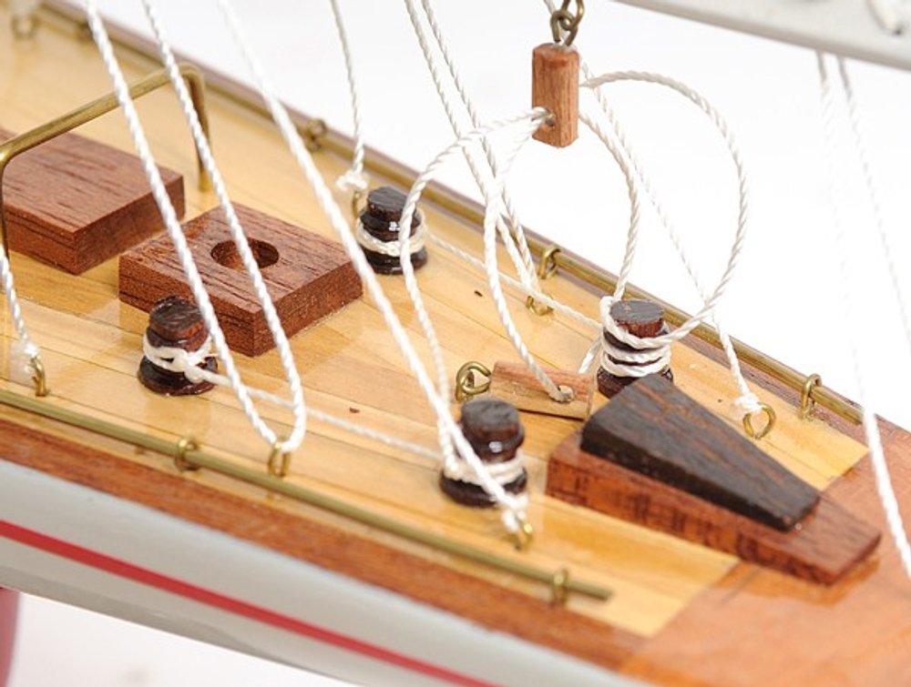32" Red and White Solid Wood Hand Painted p-Oxybis(benzenesulfonyl hydrazide) Model Boat. Home product isolated on a plain white background, in a white wood finish.