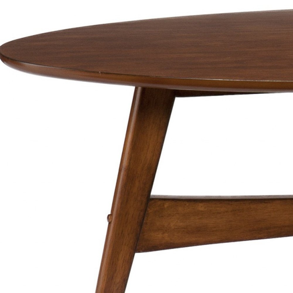 52" Brown Solid Wood With Iron Coffee Table. Coffee table isolated on a plain white background, showing a brown wood surface.