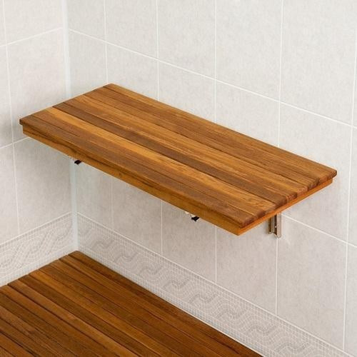 Wall-mounted teak shower bench with slatted wood surface and tiled background.