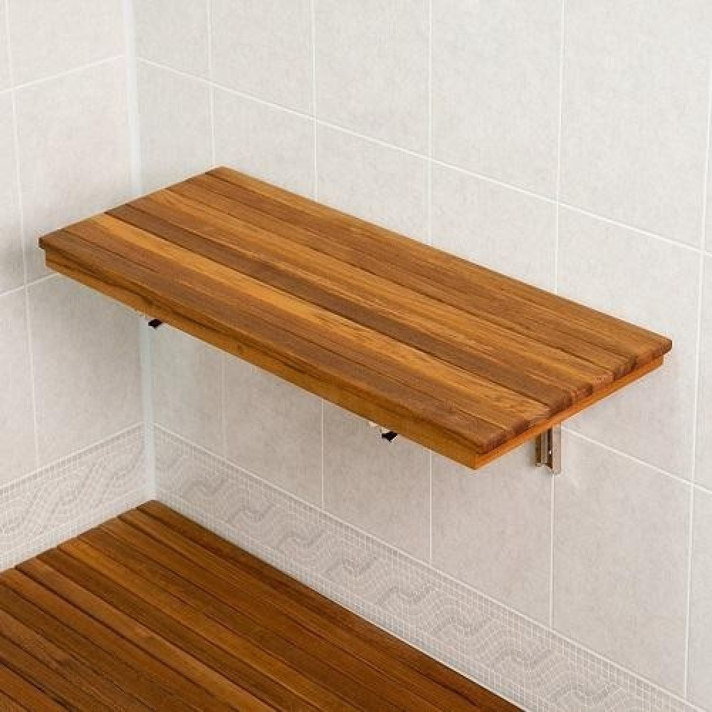 24" Premium Wall Mount Teak Shower Bench styled in a furnished interior with an off-white wall on a dark wood floor in brown teak.