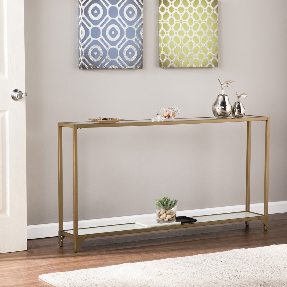 56" Clear and Gold Glass Mirrored Frame Console Table With Shelves detail shot of the gold glass finish.
