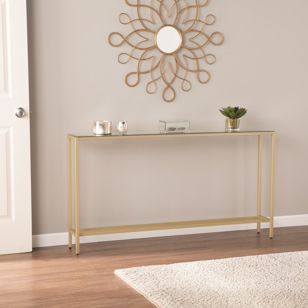 Detail view of 56" Silver and Gold Mirrored Glass Console Table, filling the frame with the gold glass texture.