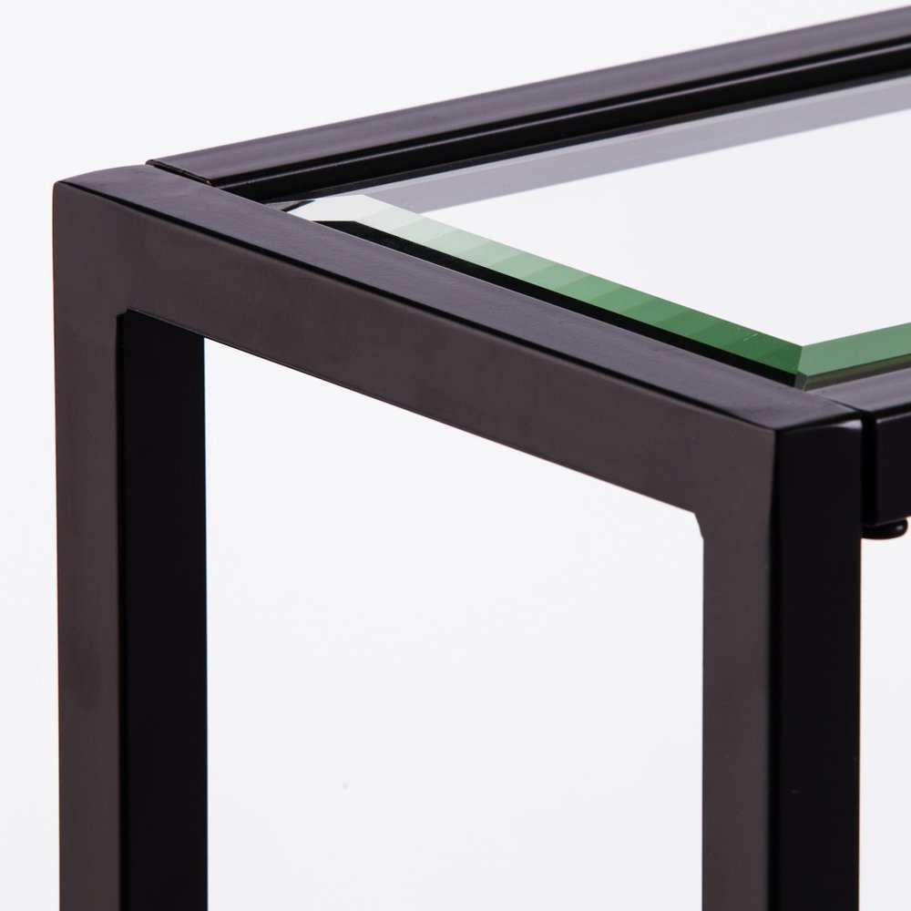 56" Clear and Black Glass Frame Console Table With Shelves. Console table isolated on a plain white background, finished in black glass.