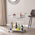 29" Silver Metal and Mirrored Glass Rolling Bar Cart With Wine Storage styled in a furnished interior with a light gray wall on a wood floor.